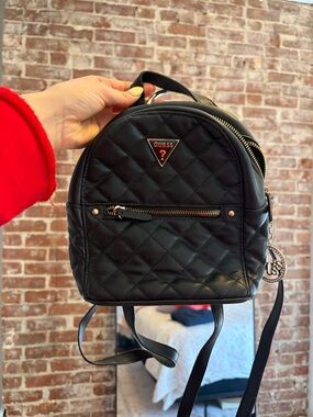 GUESS Black Quilted Mini Backpack with Silver Accents